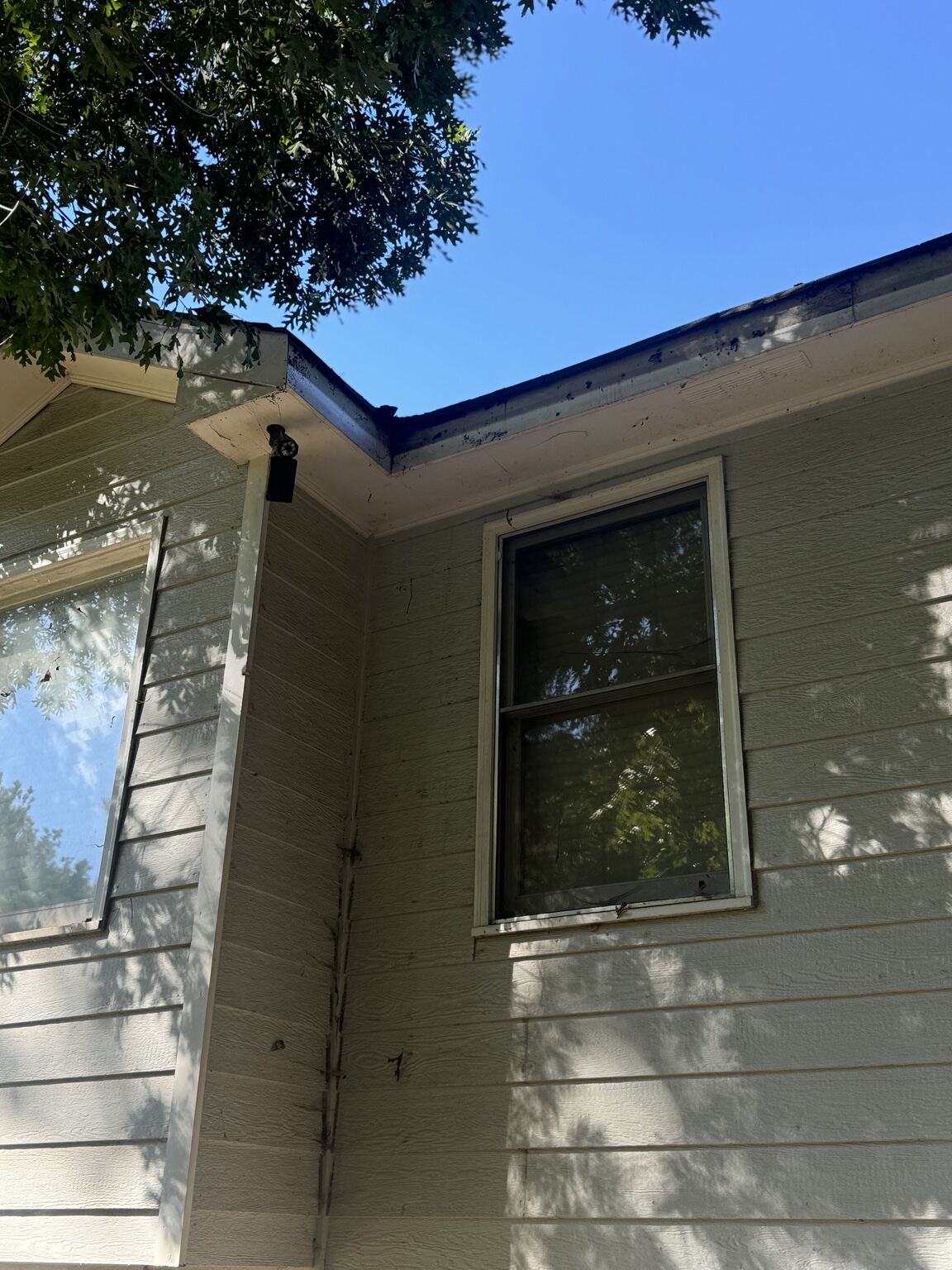 Finished eave above the same window with new fascia and soffit