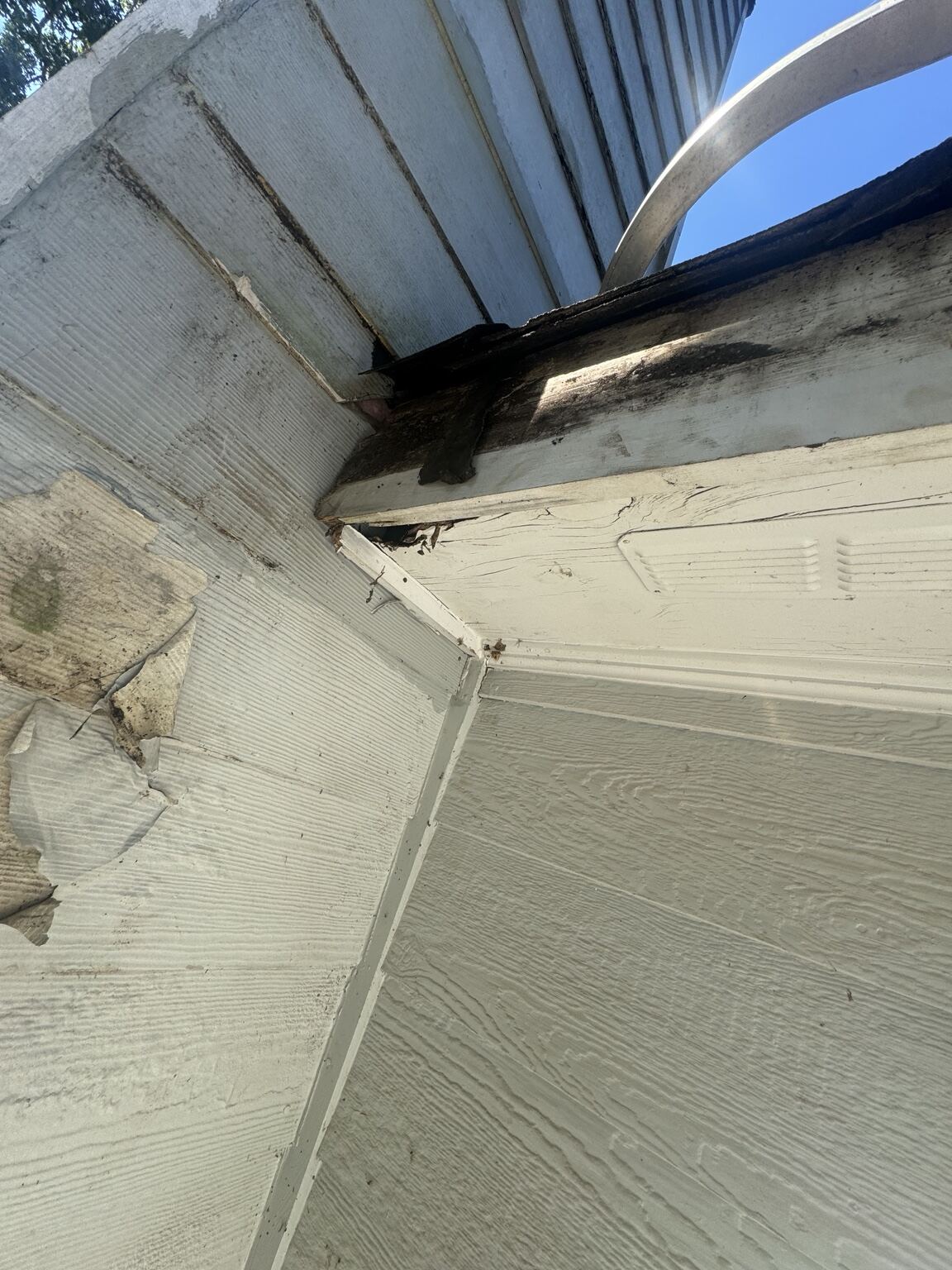 Sagging soffit and open roof edge before Mr B's Gutters repair