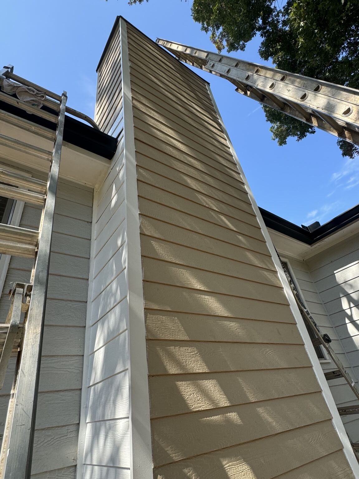 Finished chimney chase and roofline wrap after repair
