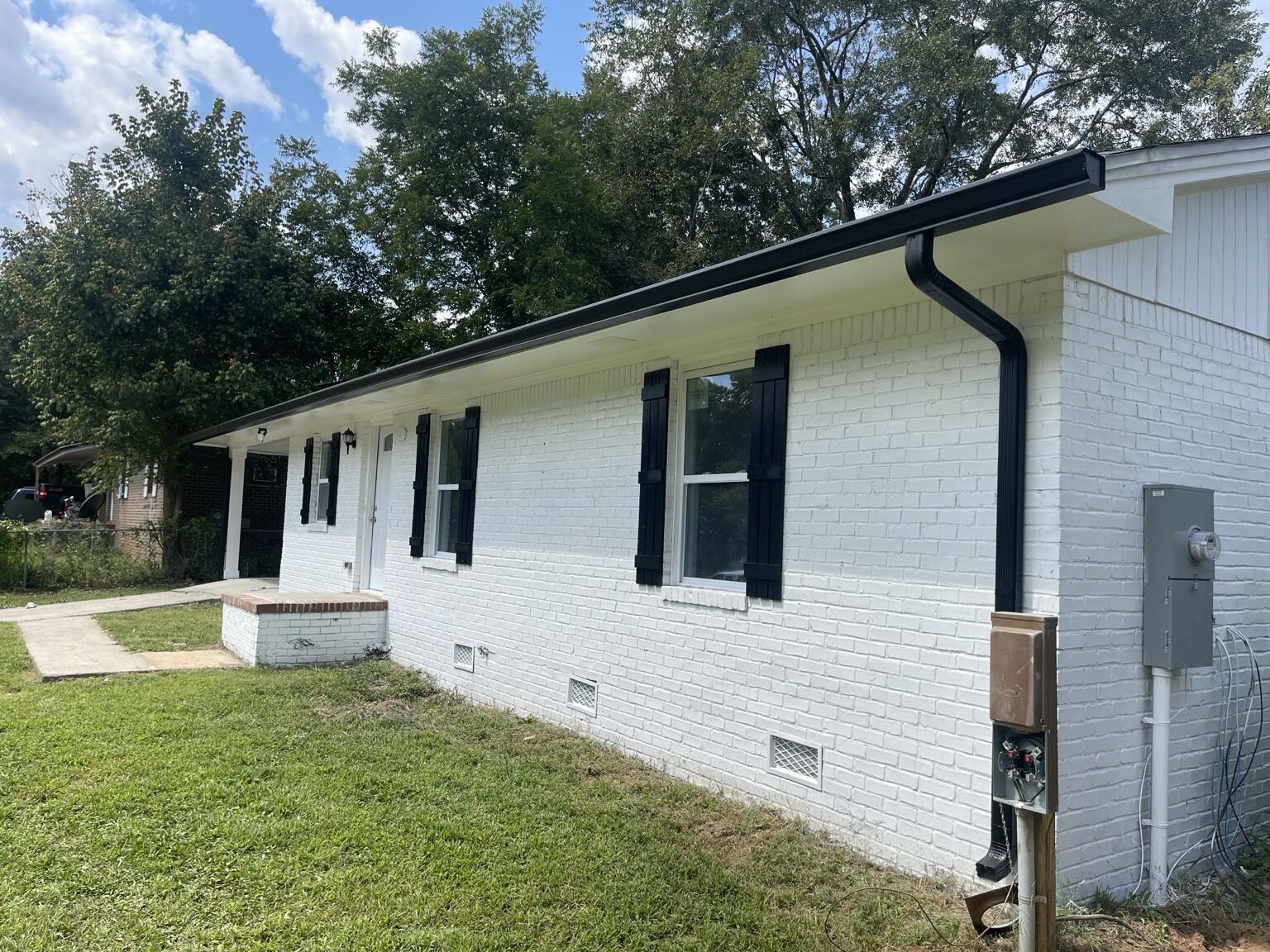 Completed Mr B's Gutters project 11 — seamless gutters, downspouts and roofline work on a Metro Atlanta property